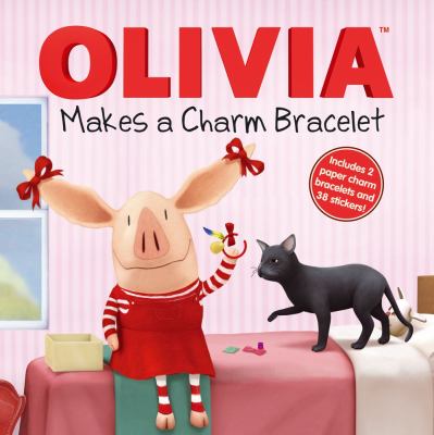 Olivia makes a charm bracelet