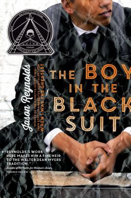 The boy in the black suit