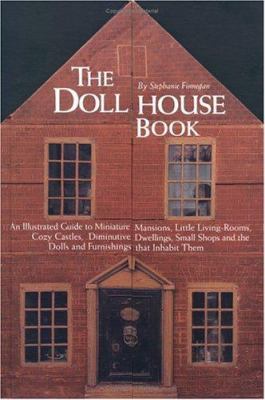 The dollhouse book : an illustrated guide to miniature mansions, little living-rooms, cozy castles, diminutive dwellings, small shops, and the dolls and furnishings that inhabit them